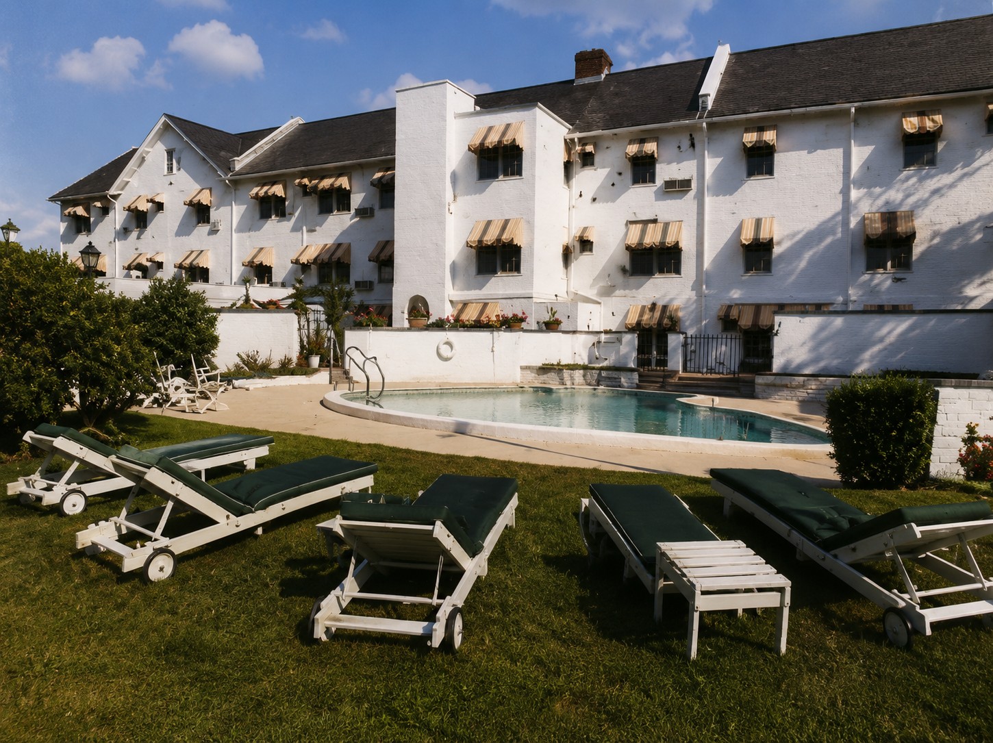 The pool area behind the hotel